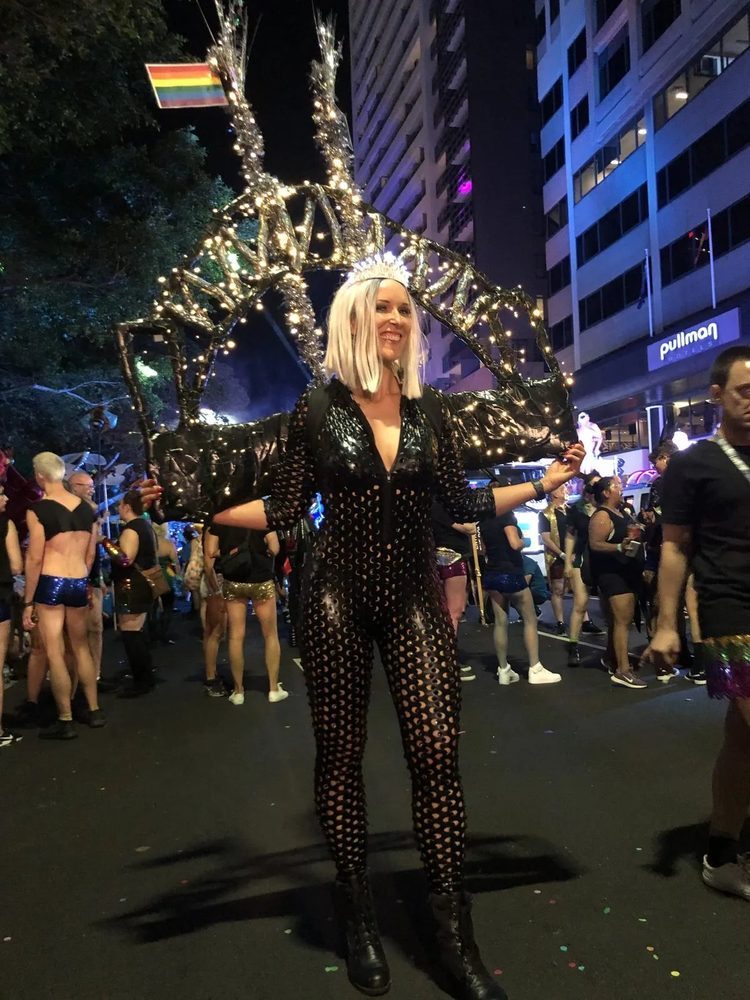 K in a sequin catsuit at the night parade