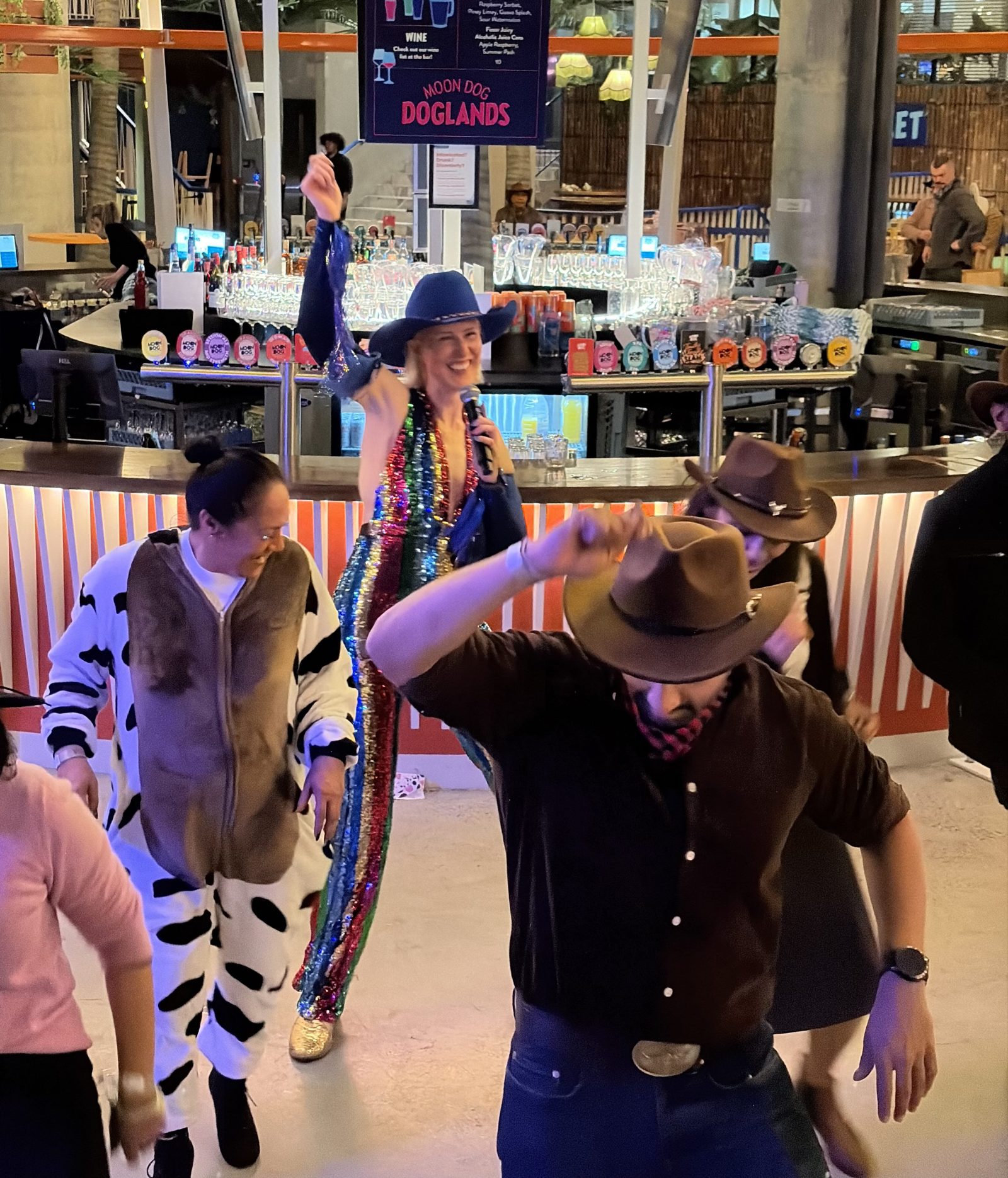Boot Scooting Society team building activity in Melbourne — the whole team up line dancing together