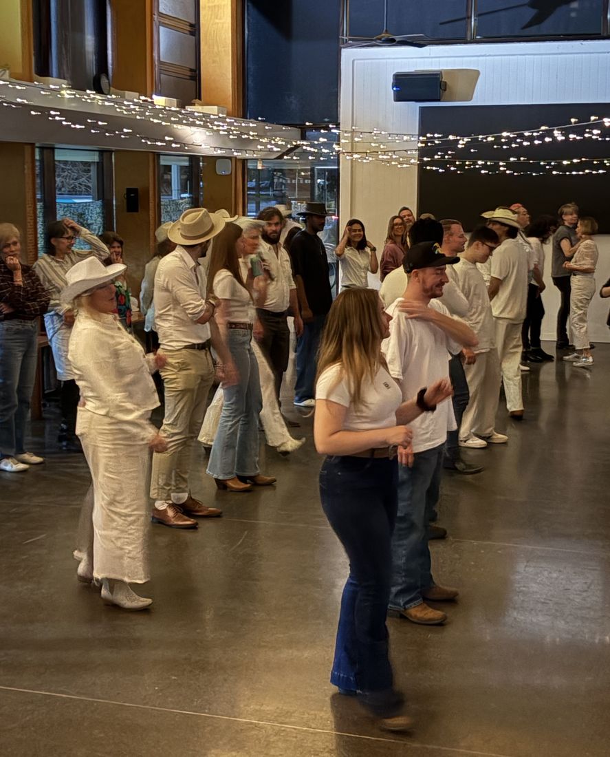 Boot Scooting Society Hoedown — the room fairy-lit and full